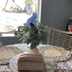 Tory Burch Cream and Soft pink cosmetic bag very roomy inside.